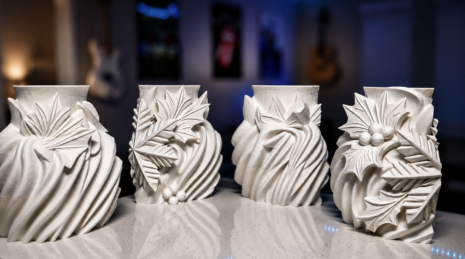 Four decorative vessel sections demonstrating modular assembly